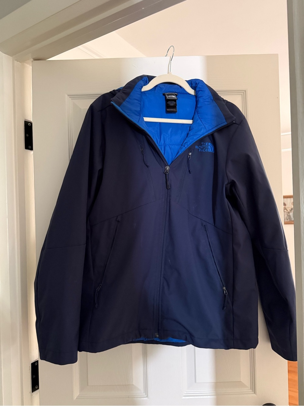 The North Face Navy Jacket with Bright Blue Lining